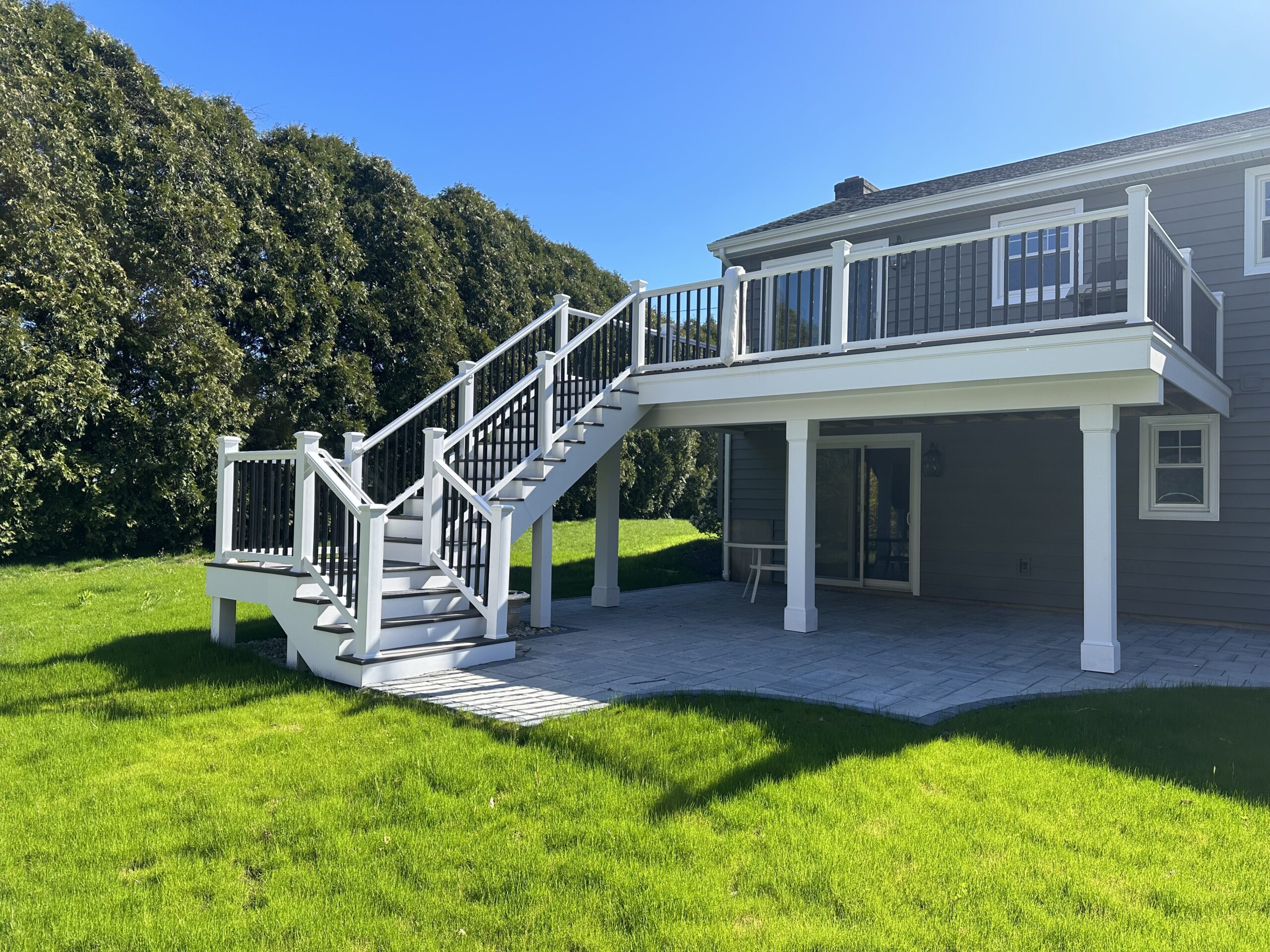 beautiful deck and patio newly constructed and added to home